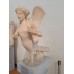 Funerary statue of a Siren playing a lyre, right side view